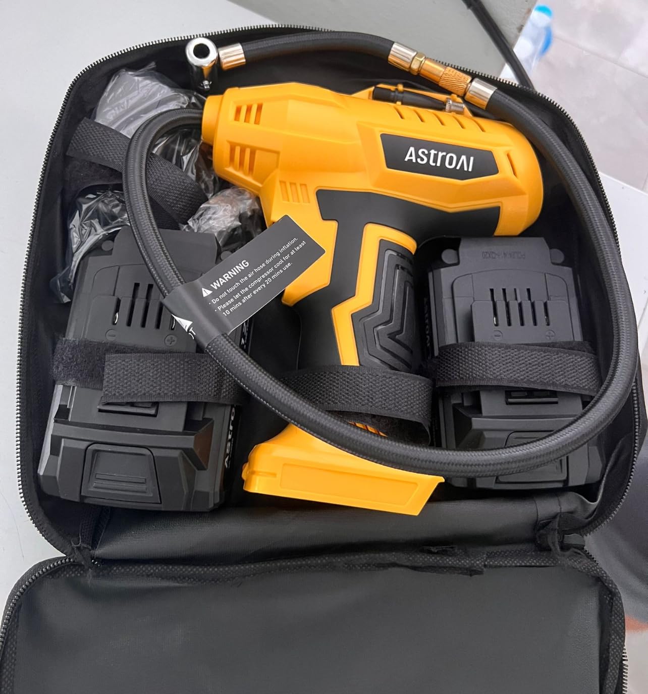 AstroAI Cordless Tire Inflator Portable Air Compressor 160PSI 12VDC Battery | Dual Power Supply Auto Shut-Off Digital Pressure Gauge Fast Inflation Air Pump for Cars Motorcycles Bikes Yellow customer photo 2