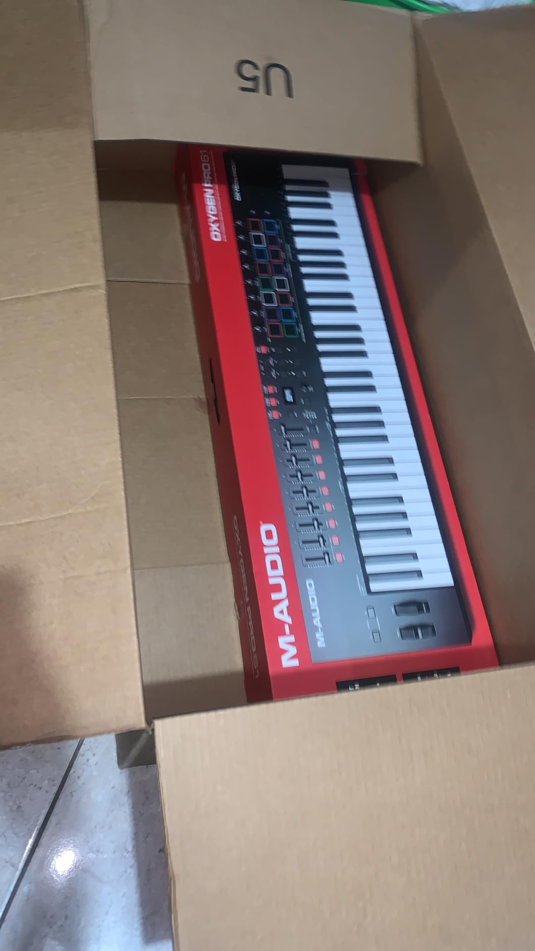 M-AUDIO Oxygen Pro 61 USB MIDI Keyboard Controller | 61 Velocity-Sensitive Keys, 16 Beat Pads, 8 Knobs, 9 Faders customer photo 1