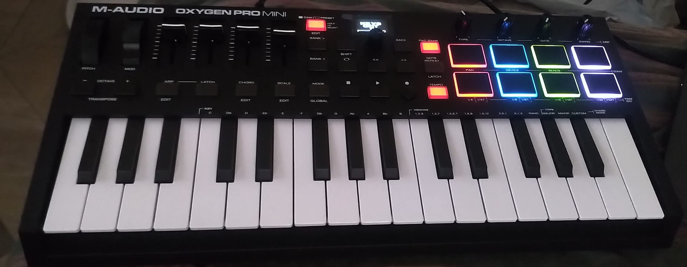 M-AUDIO Oxygen Pro Mini 32 USB MIDI Keyboard Controller | 32 Velocity-Sensitive Mini-Keys, 8 Beat Pads, 4 Knobs, 4 Faders, and Bundled DAW Recording Software, for Music Production customer photo 1