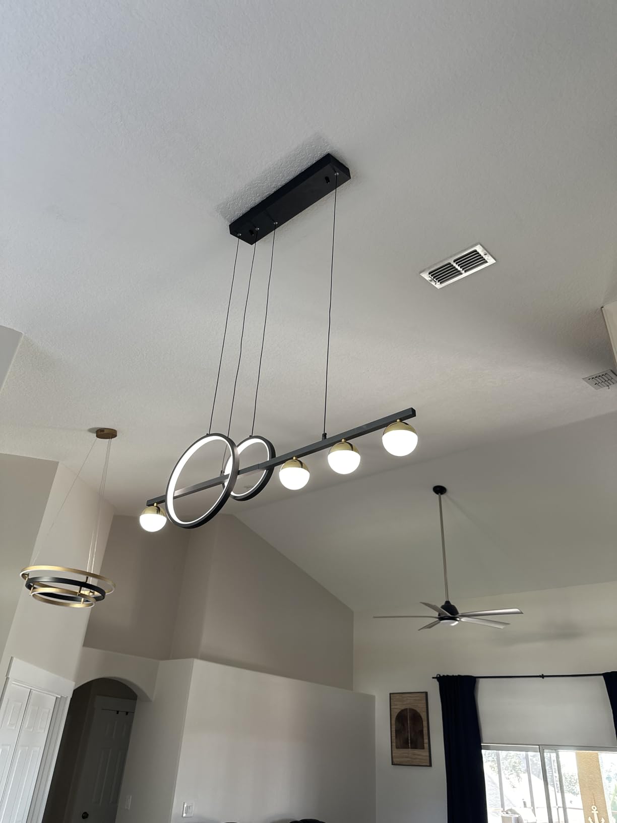 ORANOOR Modern LED Black Gold Chandelier, 39-Inch Dimmable Linear Pendant with 2 Globe Rings customer photo 2