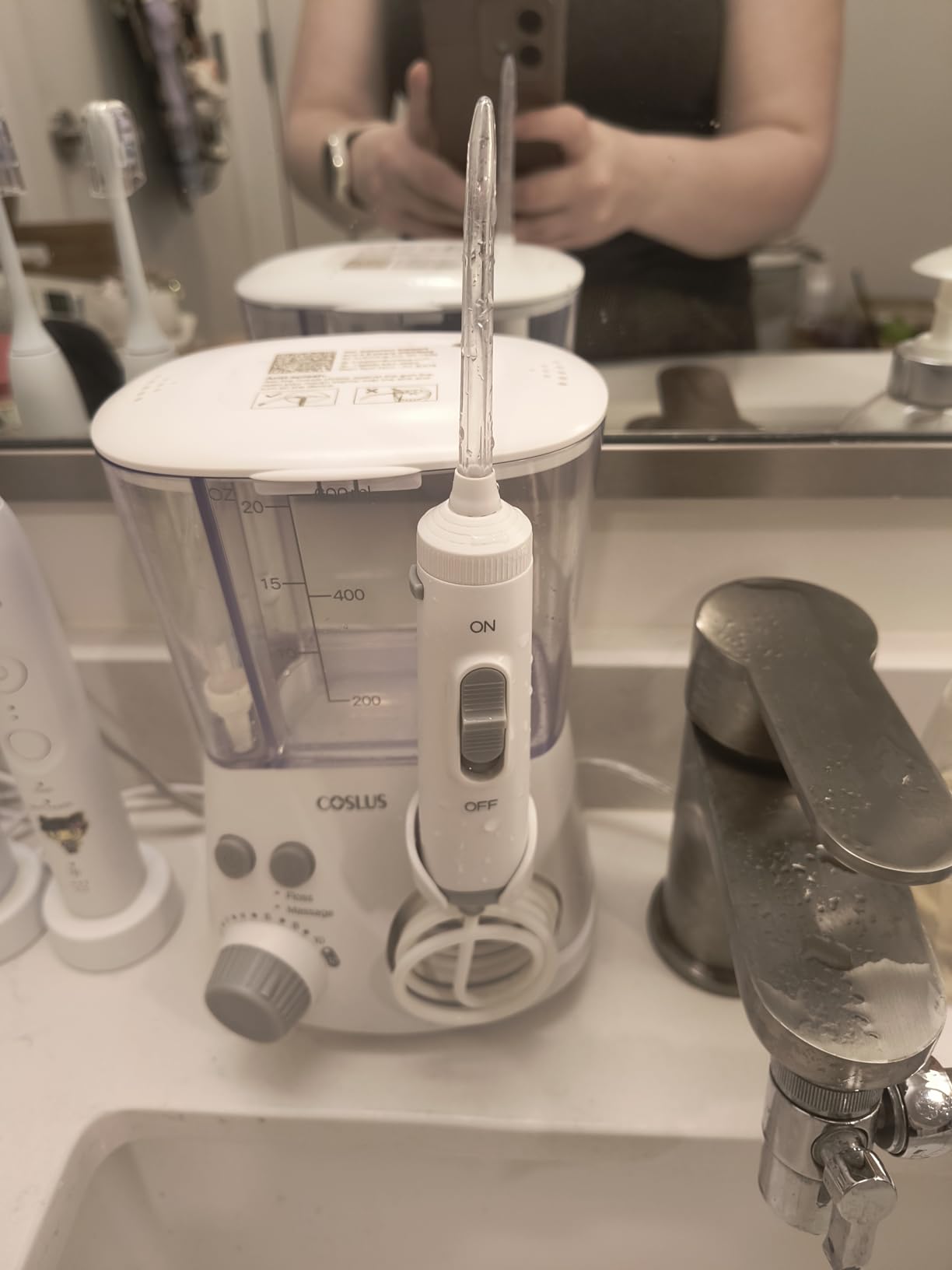 COSLUS E2 Advanced Water Flosser for Teeth: 2 Modes & 12 Pressure Settings Electric Dental Pick for Orthodontic, Braces, Sensitive Gums - Home Use, 5 Jet Tips for Multiple Users, Family, White customer photo 2