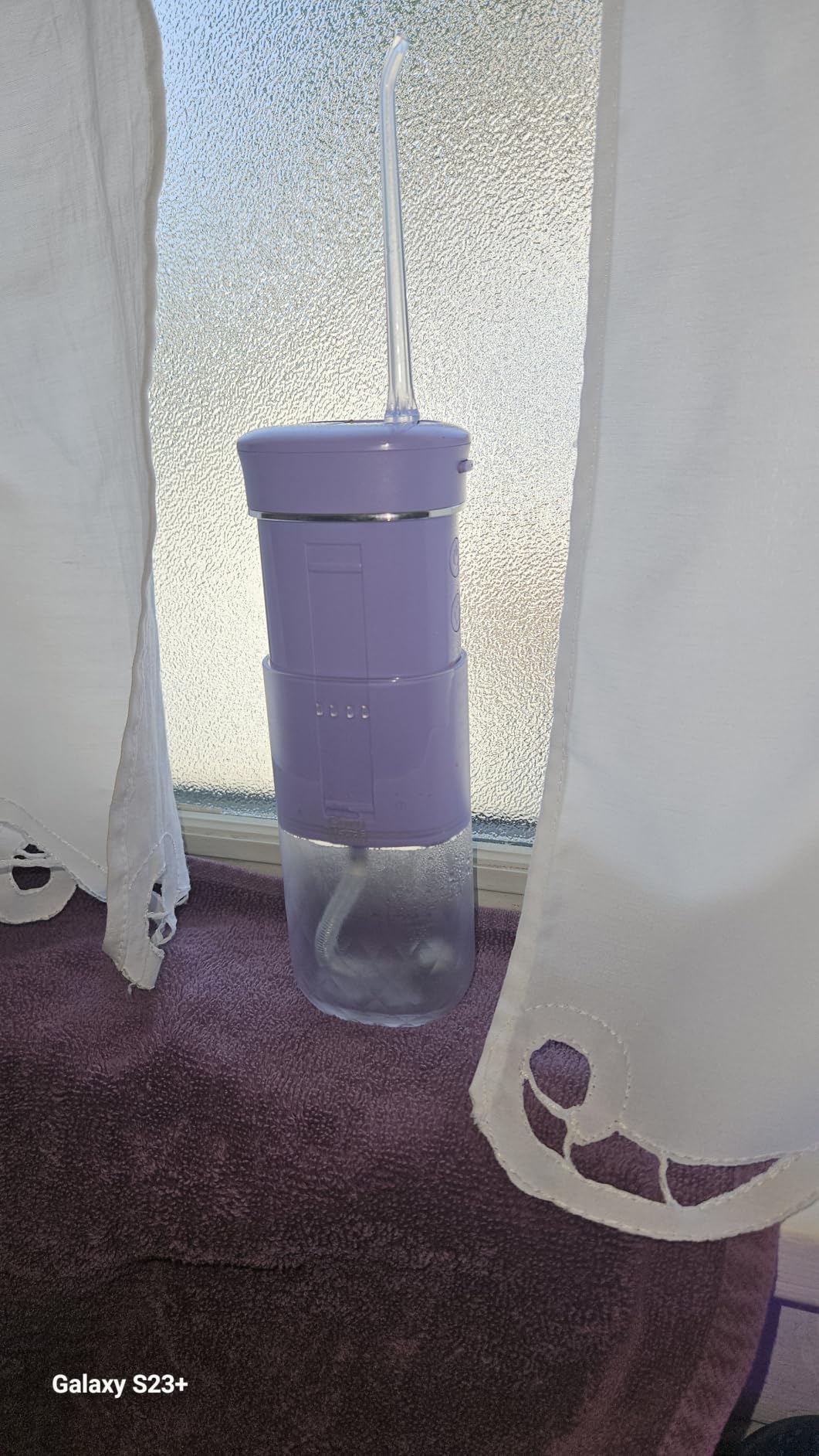 GuruNanda Mini Travel Water Flosser - Cordless Oral Irrigator with Collapsible 180ml Tank, 4 Modes, Smart Timer, IPX7 Waterproof, TSA-Friendly, Portable Flosser for Braces & Sensitive Gums, Lavender customer photo 1