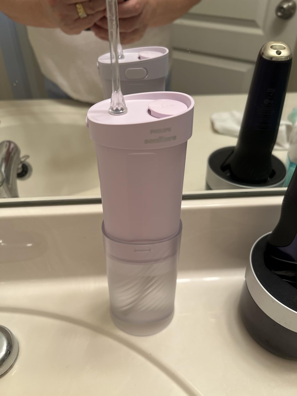 Philips Sonicare Compact Flosser 1000, Portable Water Flosser with 3 Flossing Modes, IPX7 Waterproof Oral Irrigator, Travel Friendly, Blue, Model HX3333/24 customer photo 1