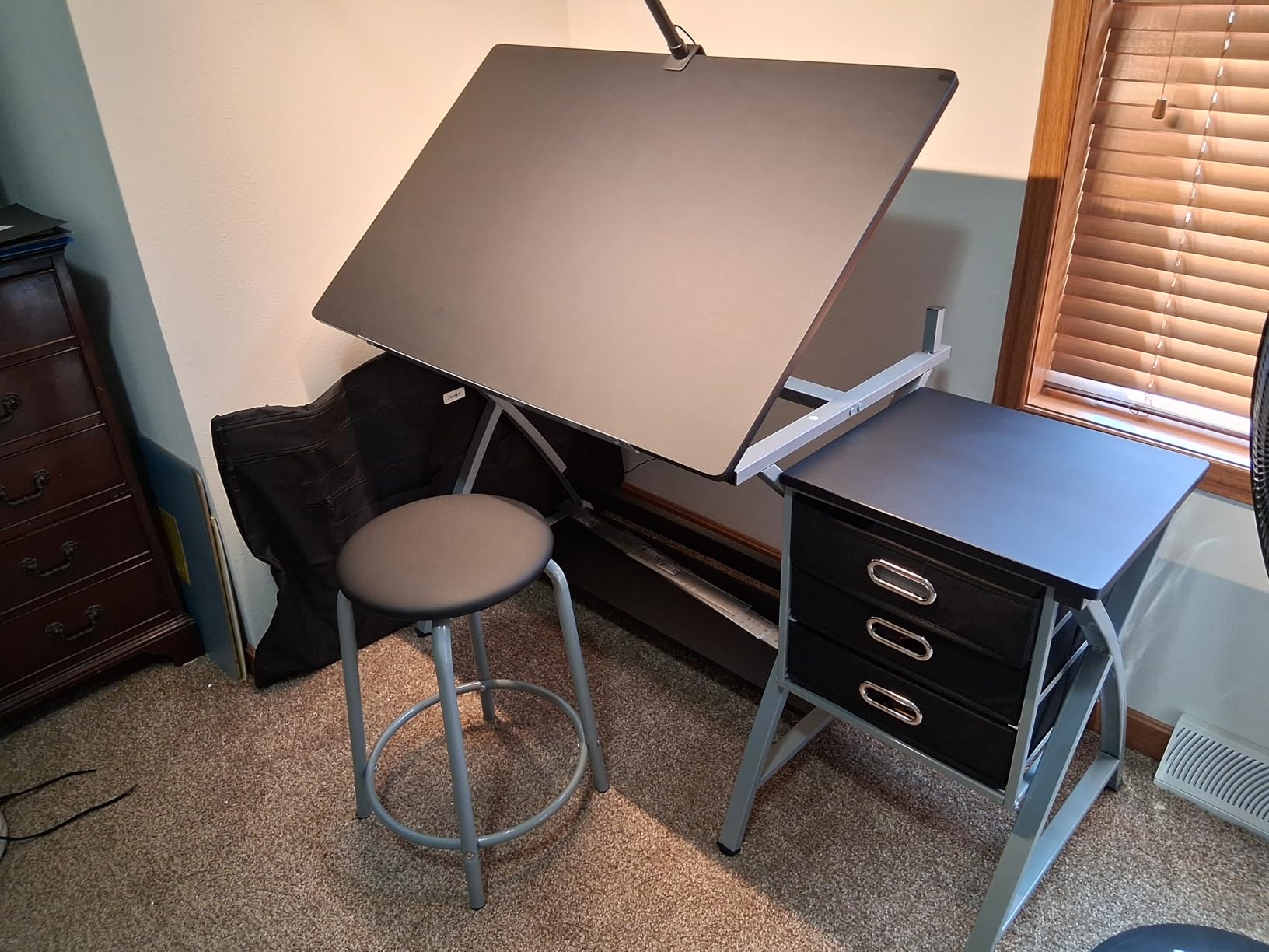 Yaheetech Drafting Table with Storage & Stool, Adjustable Art Drawing Desk | MDF tabletop on a steel frame tilts 0-60° for drawing or diamond painting, with three fabric drawers and padded round stool. customer photo 2