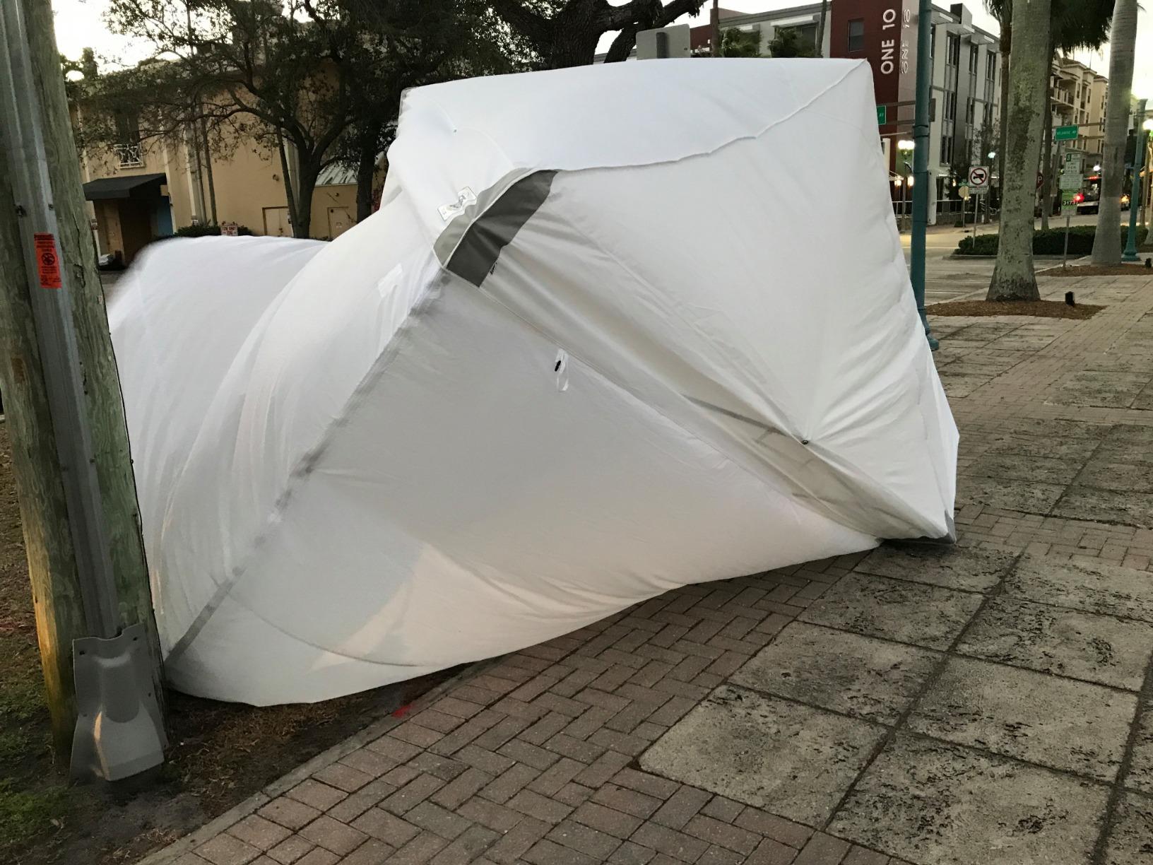 E-Z UP ES100S Instant Commercial Pop Up Canopy Tent, 10' x 10' with 3 Sidewalls, 1 Mid-Zip Sidewall and Wide-Trax Roller Bag, White customer photo 2